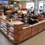 Wawa store checkout area with cashier and point-of-sale candy